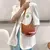 Bolsa Feminina Retrô em Couro PU | Estilo Axila, Compacta e Sofisticada – Cores Variadas: Camelo, Rosa, Verde, Marrom Claro, Branco e Preto - We Happy Shop