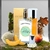 Frasco de perfume alternativo a Escape 50ml, rodeado de frutas como melón y durazno, con fondo natural, musgo.