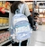 Sanrio Mochila para Crianças, Cinnamoroll Mochila Preto e Azul - Bailarina de Papel