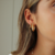 Argola Triangular Click Pequena Banho Ouro 18K - comprar online