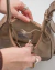 Bolsa Gota Fivela Mini Taupe - Maria Tangerina