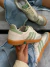 Samba Off White e Verde Claro na internet