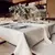 Mantel impermeable blanco tiza XL puntilla corazon