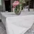Mantel impermeable estandar crudo con puntilla agujeritos