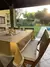 Mantel impermeable premium mostaza con fleco grande