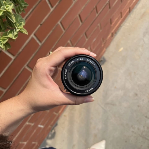 Objetiva Nikon Nikkor New 85 mm 1:1.8 MF