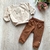 Conjunto blusão e calça em moletom na internet
