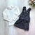 Conjunto blusa e salopete na internet