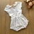 Conjunto body e jardineira em suedine na internet