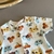 Macaquinho em suedine com botões - Charming Baby roupas e acessórios infantis