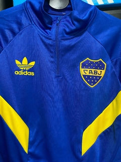 BUZO MEDIOCIERRE BOCA JUNIORS RETRO NUEVO 2025 - FAQ INDUMENTARIA