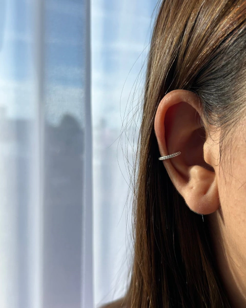 Piercing fake conch cravejado