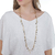 Colar corrente longo com canos e cristais dourado - comprar online