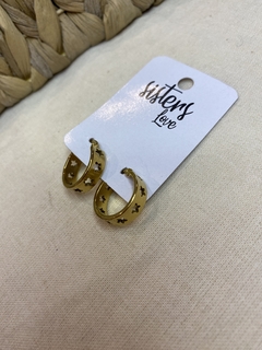 Argolla con estrellas caladas acero dorado