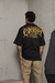 CAMISETA MASCULINA OVERSIZED EXPANSIVE PRETA/DOURADO na internet