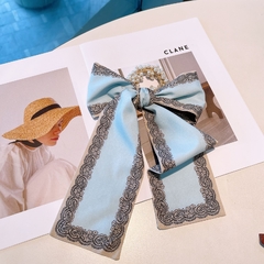 Scrunchie perlas y moño