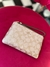 Wristlet Coach champagne
