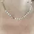 Conjunto Choker + Pulseira Coração em Aço Inoxidável na internet