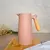 Garrafa Térmica Cabo de Madeira New Nórdica Nude 1L - La Casa - Produtos Organizadores