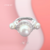 Anillo perlas y cubics en internet