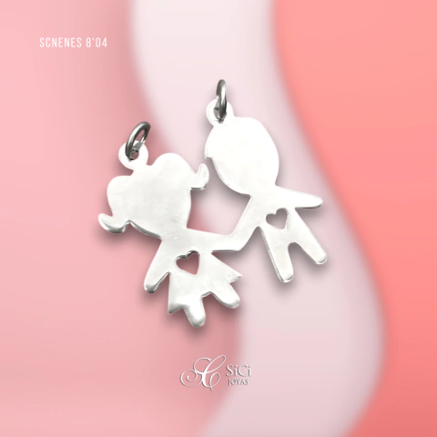 Dije niños con corazón calado