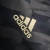 Jaqueta Corta-Vento Real Madrid II 23/24 - Masculina Adidas - Azul com listras pretas - ALFA IMPORTS | CAMISAS DE TIME 