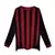 Verso da camisa titular retrô do Milan 2009/2010 em manga longa. Mostra a escrita “A.C Milan” em dourado na nuca, escudo bordado e detalhes que celebram um time repleto de craques, incluindo Gennaro Gattuso, Ronaldinho Gaúcho e Filippo Inzaghi. Ideal para