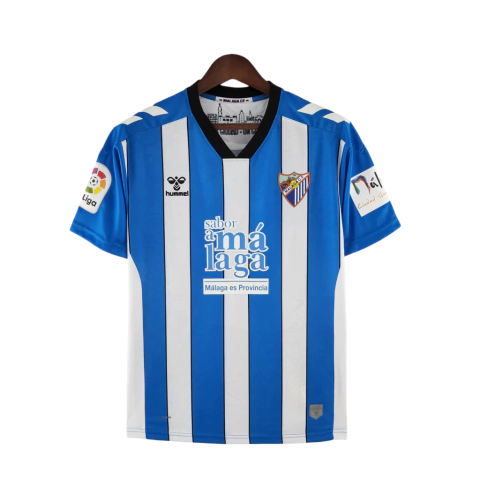 Camisa Málaga I 22/23 - Torcedor Hummel Masculina - Azul com detalhes em branco e preto