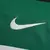 Logo swoosh da Nike em verde na camisa titular I Home masculina Sporting CP 2024/2025, design moderno, combina com as cores do clube, verde, preta.