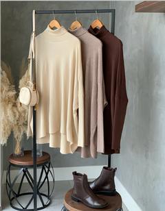 poncho Tricot na internet