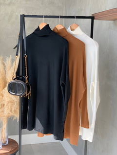 Imagem do poncho Tricot
