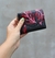 Imagen de Billetera Iris color negro estampado rojo