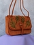 Cartera Tierra color marron en internet