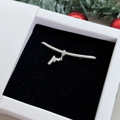 Berloque arma de fogo