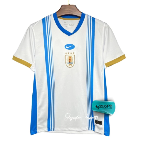 camisa Uruguai Nike treino 2024/25, camisa treino Uruguai masculina, camisa branca Uruguai Nike, camisa oficial Uruguai 2024, camisa Nike treino torcedor Uruguai, camisa Uruguai masculina 2024, roupa de treino Uruguai, camisa treino Nike masculina, camisa