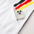 Jaqueta Agasalho Alemanha, Adidas 2025, Jaqueta Adidas Retro, Jaqueta Retrô Alemanha, Jaqueta Branca Adidas, Agasalho Alemanha 2025, Jaqueta Seleção Alemã, Estilo Retrô Adidas, Jaqueta de Futebol Adidas, Jaqueta Alemanha Retro 2025, Jaqueta Adidas para Tr