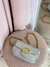 Bolsa prateada com dourado