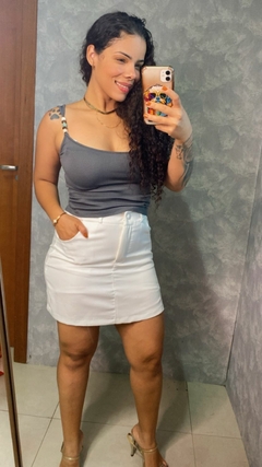 BLUSA COM MIÇANGAS NA ALÇA na internet