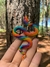Pingente serpente arco-íris na internet