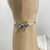 Pulseira Laço Fita Lisa Banho Ródio - comprar online