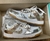 Imagem do NIKE DUNK SB LOW METALIZADO