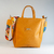 Cartera Perla Mostaza - tienda online