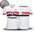 Camisa branca do São Paulo FC, com detalhes em vermelho e preto, logotipo da New Balance e patrocínio da Superbet na frente.