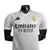 camisa-real madrid-i-home 24-25-torcedor-torcedora-Fan-femenina-
adidas-branco e preto-europa-espanha-la liga-copa da espanha-champions league-versao jogador 
