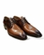 Zapatos de cuero picado