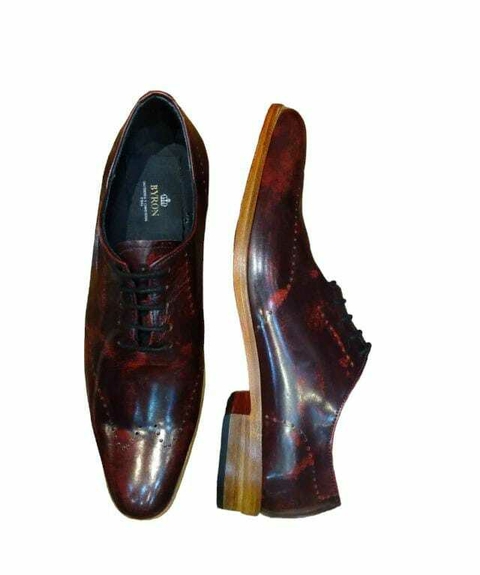 Zapatos de cuero picado