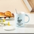 TAZA DE CERAMICA CON TAPA + CUCHARITA DISEÑO LAZY CAT - 450 ML - comprar online