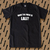 Remera negra con la frase "WHO THE FUCK IS LALI?" en letras blancas.