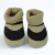Zapatillas ergonómicas botitas negras para niñas, con detalle de tejido en la parte superior.

