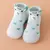 Zapatillas ergonómicas para bebés con diseño de animal y corazones verdes, suela flexible y puntera blanca